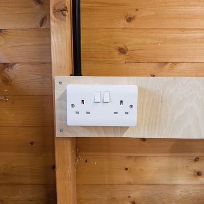 Double socket fitted inside a garden shed